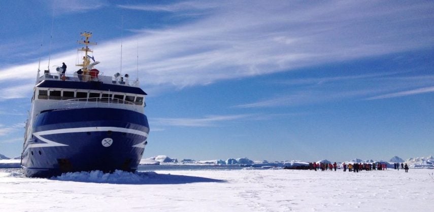 Early season visitors enjoy an opportunity to walk on the ice in Antarctica