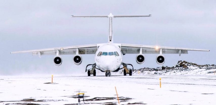 A plane lands on the runway of King George Island in Antarctica