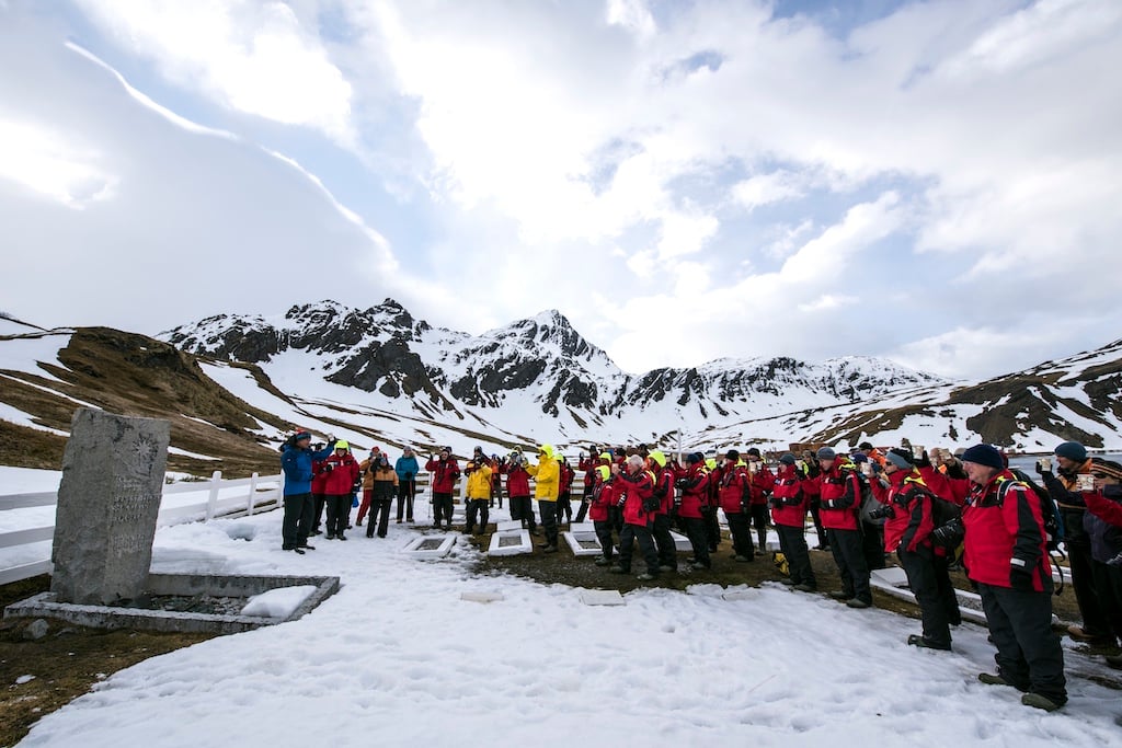 Toasting the Boss at Shackleton's Grave in Grytviken, South Georgia