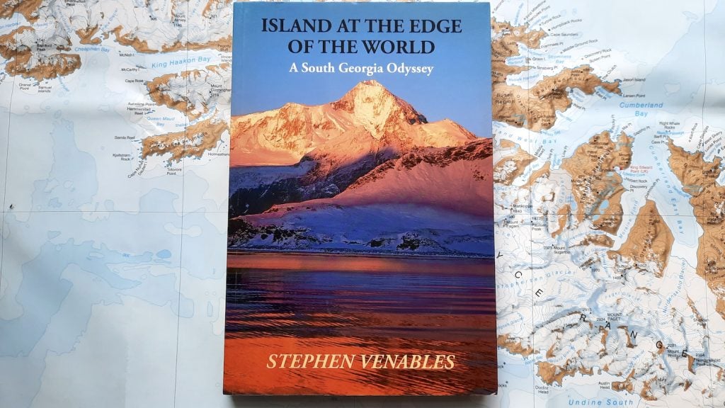 The book ‘Island at the Edge of the World’ by Stephen Venables, sitting on a map of South Georgia