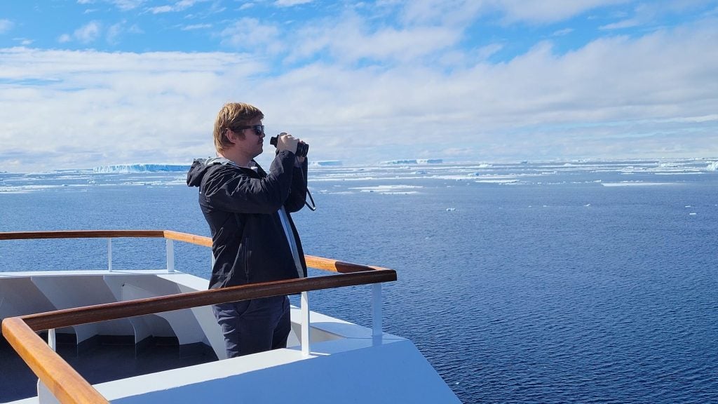 Nardus Erasmus of Swoop Antarctic on a cruise ship