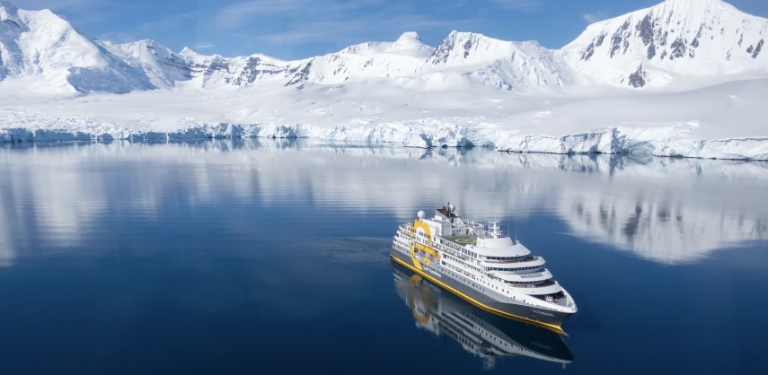 Aerial view of the Ultramarine cruise ship during a helicopter flight in Antarctica