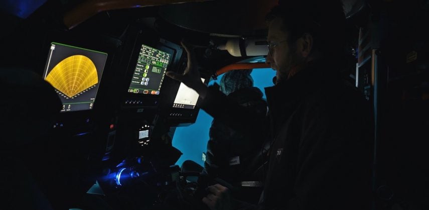 Antarctic minisubmarine pilot at work